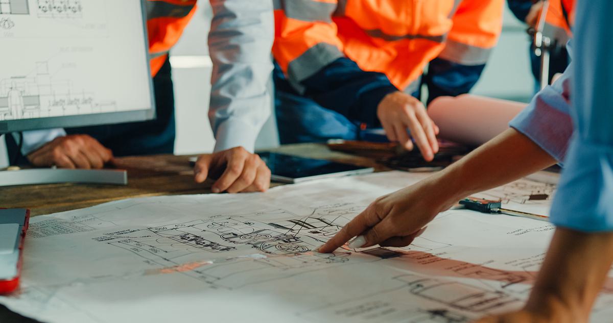 Engineers drawing up plans